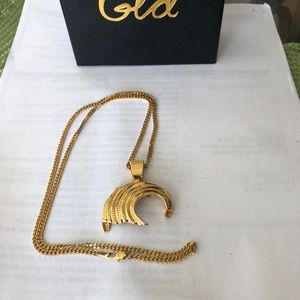 18k Gold plated chain w/ wave pendant.